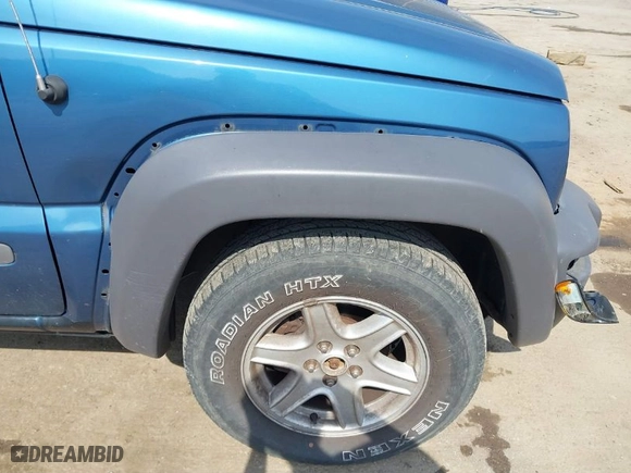 2004 Jeep Liberty Sport with VIN 1J4GL48K94W168655, listed as a IAAI auction lot 41795213 with 140,679 mi miles. Bid and sale history available at carsss.com. Image 12.