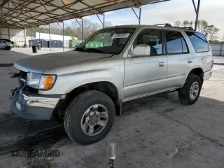 2000 Toyota 4Runner SR5 with VIN JT3GN86R5Y0146494, listed as a Copart auction lot 44984065 with 312,198 mi miles and Salvage Title. Bid and sale history available at DreamBid. Image 1.