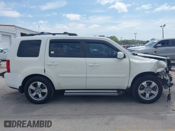 2014 Honda Pilot EX-L with VIN 5FNYF4H52EB055549, listed as a IAAI auction lot 42086456 with 292,594 mi miles and . Bid and sale history available at carsss.com. Image 14.