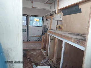 1995 GMC Vandura z VIN 1GTEG25K5SF548518, wystawiony jako IAAI lot #40664471 z przebiegiem 157 506 mil mil oraz . Historia ofert i sprzedaży dostępna na DreamBid. Obrazek 8.