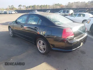 2004 Mitsubishi Galant ES with VIN 4A3AB36F74E077627, listed as a IAAI auction lot 41734910 with 196,299 mi miles. Bid and sale history available at carsss.com. Image 3.