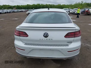 2021 Volkswagen Arteon SEL R-Line z VIN WVWSR7AN6ME007156, wystawiony jako IAAI lot #42254735 z przebiegiem 32 004 mil mil oraz . Historia ofert i sprzedaży dostępna na DreamBid. Obrazek 17.
