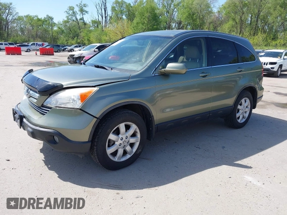 2007 Honda CR-V EX-L z VIN JHLRE387X7C073092, wystawiony jako IAAI lot #42090276 z przebiegiem 150 297 mil mil oraz . Historia ofert i sprzedaży dostępna na DreamBid. Obrazek 19.