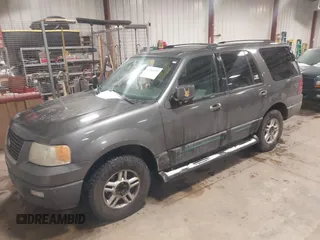 2004 Ford Expedition Special Service with VIN 1FMPU15L74LA92803, listed as a IAAI auction lot 41540002 with 312,510 mi miles. Bid and sale history available at carsss.com. Image 2.