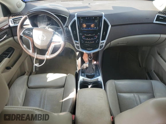 2014 Cadillac SRX Premium Collection z VIN 3GYFNGE32ES573872, wystawiony jako Copart lot #49871955 z przebiegiem 119 362 mil mil oraz Szkody całkowita. Historia ofert i sprzedaży dostępna na DreamBid. Obrazek 8.