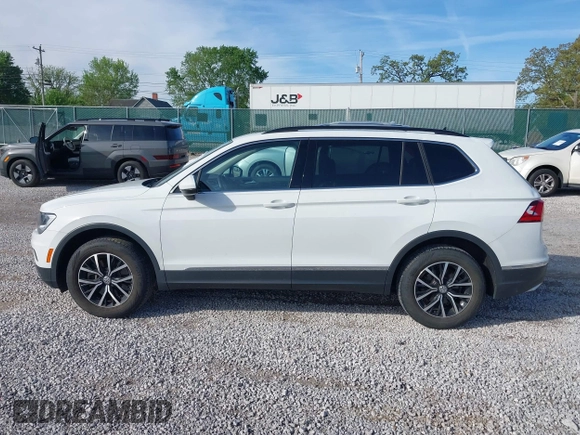 2021 Volkswagen Tiguan SE with VIN 3VV2B7AX6MM139903, listed as a IAAI auction lot 42060657 with 42,747 mi miles and . Bid and sale history available at DreamBid. Image 14.