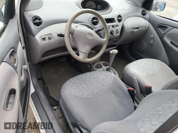 2000 Toyota ECHO with VIN JTDAT1230Y0074894, listed as a Copart auction lot 82236714 with 179,043 mi miles and Salvage Title. Bid and sale history available at DreamBid. Image 8.