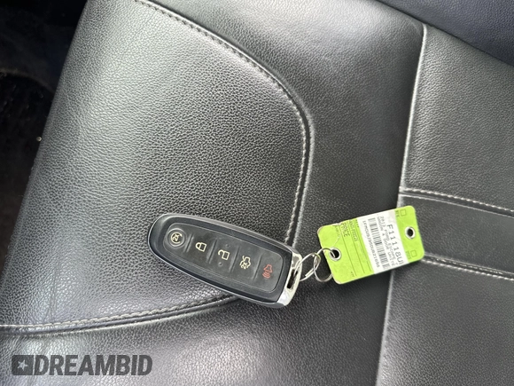 2013 Ford Escape Titanium with VIN 1FMCU9J95DUB21698, listed as a IAAI auction lot 42694998 with 170,593 mi miles and . Bid and sale history available at DreamBid. Image 9.