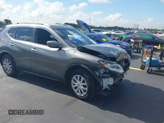 2017 Nissan Rogue SV z VIN JN8AT2MT0HW388730, wystawiony jako IAAI lot #42289935 z przebiegiem 124 943 mil mil oraz . Historia ofert i sprzedaży dostępna na DreamBid. Obrazek 1.