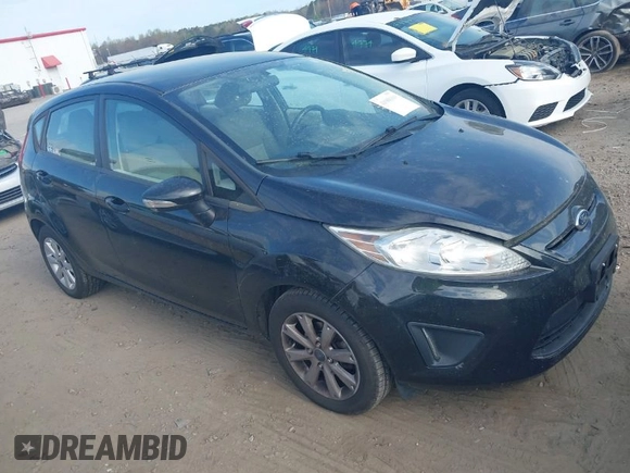 2013 Ford Fiesta SE with VIN 3FADP4EJ7DM140755, listed as a IAAI auction lot 41908366 with 68,744 mi miles. Bid and sale history available at carsss.com. Image 1.