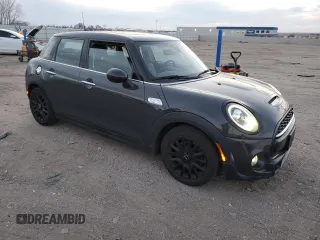 2019 MINI Hardtop 4 Door Cooper S z VIN WMWXU3C56K2H86633, wystawiony jako Copart lot #84340094 z przebiegiem 67 712 mil mil oraz Szkoda całkowita • Salvage title. Historia ofert i sprzedaży dostępna na DreamBid. Obrazek 4.