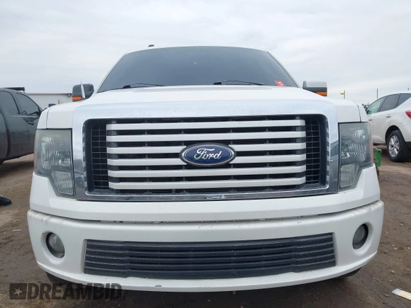 2011 Ford F-150 Lariat with VIN 1FTFW1E60BFA47055, listed as a IAAI auction lot 41693226 with 170,594 mi miles. Bid and sale history available at carsss.com. Image 6.