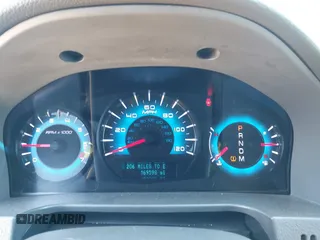 2010 Ford Fusion SEL with VIN 3FAHP0JG1AR297264, listed as a IAAI auction lot 41882838 with 169,598 mi miles. Bid and sale history available at carsss.com. Image 7.