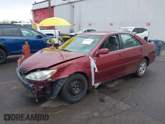 2005 Toyota Camry LE with VIN 4T1BF32K95U092132, listed as a IAAI auction lot 41831969 with 103,466 mi miles and . Bid and sale history available at DreamBid. Image 2.