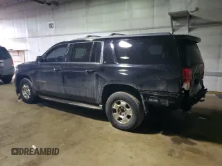2015 Chevrolet Suburban LT with VIN 1GNSKJKC6FR262570, listed as a Copart auction lot 46907675 with 179,425 mi miles and Clean Title. Bid and sale history available at DreamBid. Image 2.
