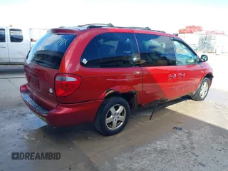 2005 Dodge Grand Caravan with VIN 2D4G944L75R310409, listed as a IAAI auction lot 41781132 with 128,120 mi miles and . Bid and sale history available at DreamBid. Image 4.