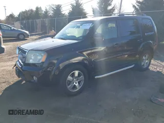 2011 Honda Pilot EX-L with VIN 5FNYF4H51BB023347, listed as a IAAI auction lot 41877106 with 167,039 mi miles. Bid and sale history available at carsss.com. Image 18.