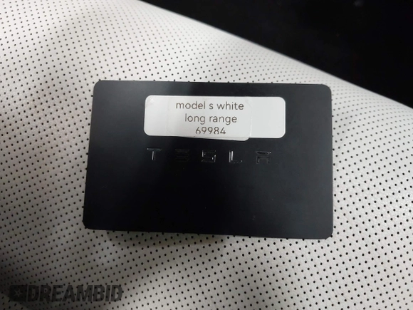 2022 Tesla Model S with VIN 5YJSA1E59NF469984, listed as a IAAI auction lot 42426490 with Not provided miles and . Bid and sale history available at DreamBid. Image 9.