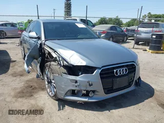 2013 Audi A6 Premium Plus with VIN WAUDFAFCXDN071428, listed as a IAAI auction lot 42565441 with 131,602 mi miles and . Bid and sale history available at DreamBid. Image 1.