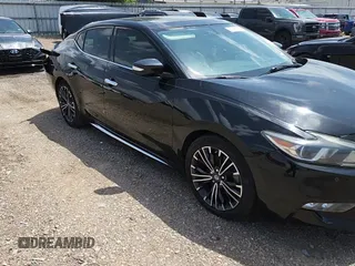 2016 Nissan Maxima SL with VIN 1N4AA6AP1GC409820, listed as a Copart auction lot 60888725 with 124,998 mi miles and Salvage title. Bid and sale history available at DreamBid. Image 13.