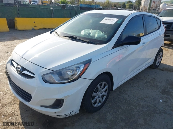 2014 Hyundai Accent GS with VIN KMHCT5AE8EU155466, listed as a IAAI auction lot 41905867 with 129,178 mi miles. Bid and sale history available at carsss.com. Image 2.