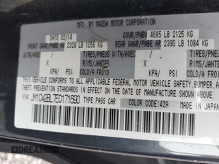 2014 Mazda 5 Sport with VIN JM1CW2BL7E0171690, listed as a IAAI auction lot 42048668 with 196,775 mi miles and . Bid and sale history available at carsss.com. Image 9.