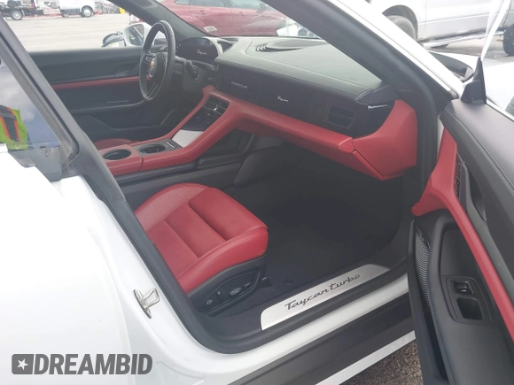 2021 Porsche Taycan Turbo z VIN WP0AC2Y16MSA63752, wystawiony jako IAAI lot #41838152 z przebiegiem 17 304 mil mil oraz . Historia ofert i sprzedaży dostępna na DreamBid. Obrazek 5.