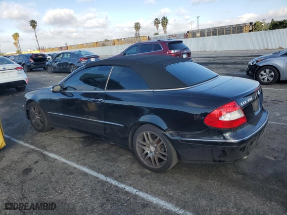 2009 Mercedes-Benz CLK-Class 3.5L with VIN WDBTK56F49T102962, listed as a Copart auction lot 43634515 with 127,133 mi miles and Salvage Title. Bid and sale history available at carsss.com. Image 2.