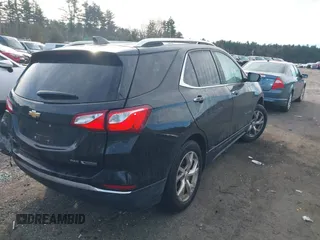 2018 Chevrolet Equinox Premier with VIN 2GNAXVEV7J6237540, listed as a IAAI auction lot 41201641 with 153,337 mi miles and . Bid and sale history available at DreamBid. Image 4.