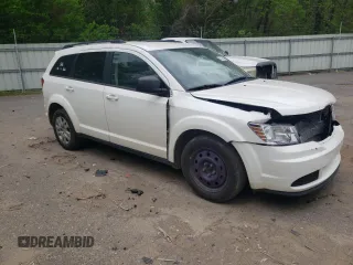 2020 Dodge Journey SE Value with VIN 3C4PDCAB6LT207097, listed as a Copart auction lot 51216705 with 140,724 mi miles and Salvage Title. Bid and sale history available at carsss.com. Image 4.