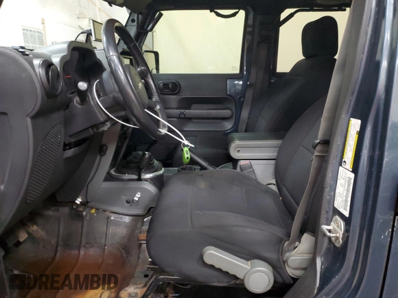 2007 Jeep Wrangler Unlimited Rubicon with VIN 1J4GA69197L100286, listed as a Copart auction lot 54210635 with Not provided miles and Clean title. Bid and sale history available at DreamBid. Image 7.
