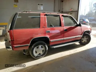 1999 GMC Yukon with VIN 1GKEK13R0XJ768859, listed as a Copart auction lot 84005304 with 190,960 mi miles and Salvage Title. Bid and sale history available at carsss.com. Image 3.