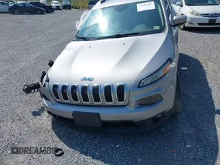 2016 Jeep Cherokee Altitude with VIN 1C4PJMCBXGW183284, listed as a IAAI auction lot 42346167 with 144,493 mi miles and . Bid and sale history available at DreamBid. Image 13.