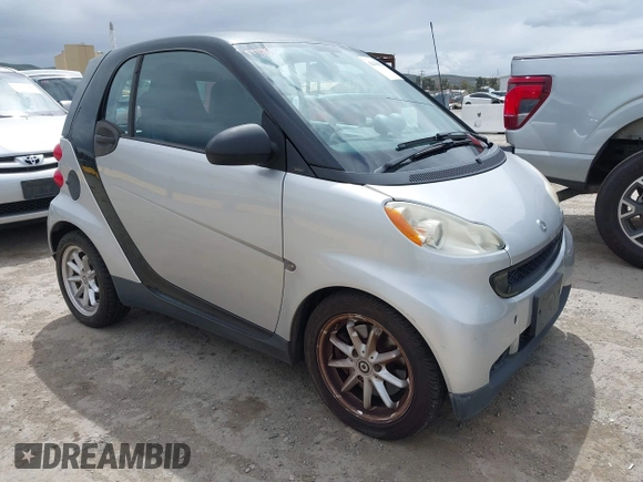 2008 Smart fortwo Pure z VIN WMEEJ31X18K191722, wystawiony jako IAAI lot #42138617 z przebiegiem 117 263 mil mil oraz . Historia ofert i sprzedaży dostępna na DreamBid. Obrazek 1.