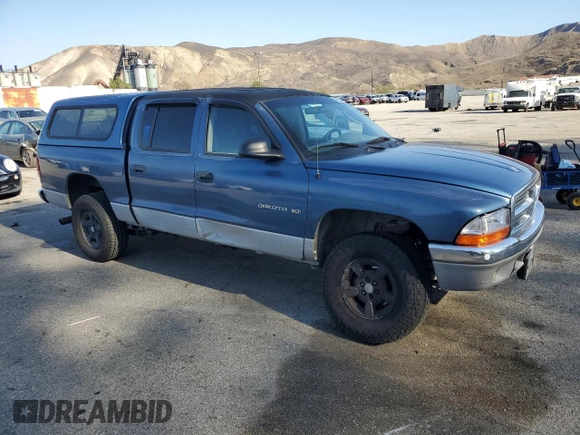 2001 Dodge Dakota with VIN 1B7HL2AX71S339829, listed as a Copart auction lot 44539825 with 183,961 mi miles and Salvage title. Bid and sale history available at DreamBid. Image 4.