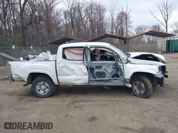 2022 Toyota Tacoma SR with VIN 3TYAX5GN3NT062077, listed as a IAAI auction lot 41886531 with 58,687 mi miles and . Bid and sale history available at DreamBid. Image 13.