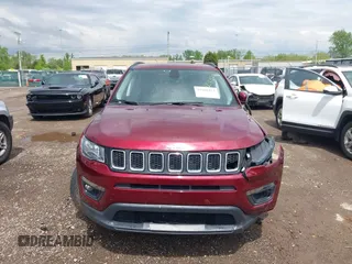 2021 Jeep Compass Latitude with VIN 3C4NJDBBXMT504993, listed as a IAAI auction lot 42181872 with 56,053 mi miles and . Bid and sale history available at DreamBid. Image 12.