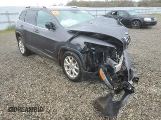 2014 Jeep Cherokee Latitude with VIN 1C4PJMCS7EW297014, listed as a Copart auction lot 48850285 with 0 mi miles and Salvage Title. Bid and sale history available at carsss.com. Image 4.