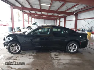 2020 Dodge Charger SXT with VIN 2C3CDXBG0LH211627, listed as a IAAI auction lot 41793868 with 104,587 mi miles and . Bid and sale history available at DreamBid. Image 14.