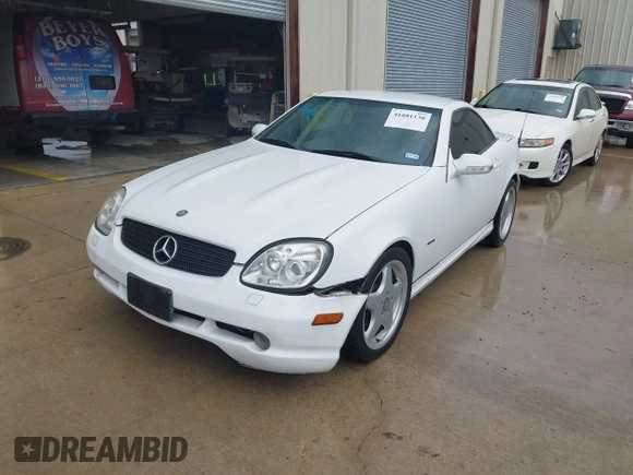 2001 Mercedes-Benz SLK 230/320 z VIN WDBKK65FX1F194536, wystawiony jako IAAI lot #41881130 z przebiegiem 108 544 mil mil oraz . Historia ofert i sprzedaży dostępna na DreamBid. Obrazek 2.