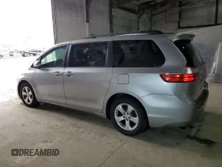 2015 Toyota Sienna LE AAS with VIN 5TDKK3DC1FS581300, listed as a Copart auction lot 49647835 with 128,659 mi miles and Salvage Title. Bid and sale history available at DreamBid. Image 2.