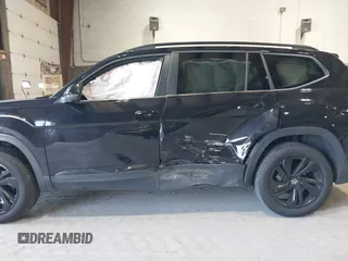 2022 Volkswagen Atlas SE z VIN 1V2KP2CA5NC509929, wystawiony jako IAAI lot #42231410 z przebiegiem 84 678 mil mil oraz . Historia ofert i sprzedaży dostępna na DreamBid. Obrazek 6.