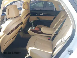 2014 Audi A8 3.0T z VIN WAURGAFDXEN006902, wystawiony jako IAAI lot #41099662 z przebiegiem 118 734 mil mil oraz . Historia ofert i sprzedaży dostępna na DreamBid. Obrazek 8.