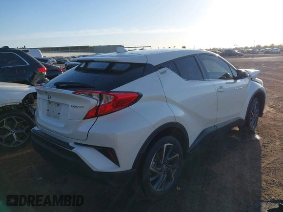 2021 Toyota C-HR LE with VIN JTNKHMBX3M1114590, listed as a IAAI auction lot 41560459 with 61,803 mi miles. Bid and sale history available at carsss.com. Image 4.