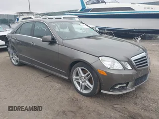 2011 Mercedes-Benz E-Class E 350 Luxury with VIN WDDHF8HB3BA348741, listed as a IAAI auction lot 41424618 with 117,306 mi miles. Bid and sale history available at carsss.com. Image 1.