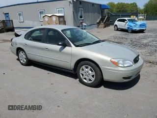 2007 Ford Taurus SE with VIN 1FAFP53U97A112369, listed as a Copart auction lot 56670245 with 95,855 mi miles and Salvage title. Bid and sale history available at DreamBid. Image 4.