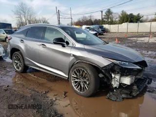 2021 Lexus RX with VIN 2T2YGMDA3MC064310, listed as a Copart auction lot 79701303 with 34,161 mi miles. Bid and sale history available at carsss.com. Image 4.