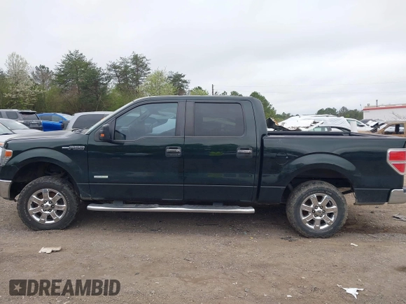 2014 Ford F-150 XL with VIN 1FTFW1CT9EKG41762, listed as a IAAI auction lot 41797534 with 218,089 mi miles. Bid and sale history available at carsss.com. Image 14.