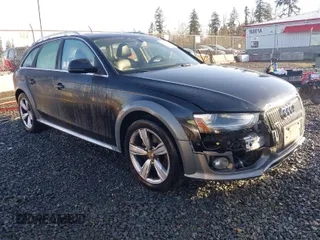 2014 Audi allroad Premium Plus with VIN WA1UFAFL1EA156213, listed as a IAAI auction lot 41610274 with 115,688 mi miles. Bid and sale history available at carsss.com. Image 1.