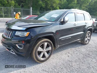 2016 Jeep Grand Cherokee Overland with VIN 1C4RJFCG3GC417699, listed as a IAAI auction lot 42419054 with 109,911 mi miles and . Bid and sale history available at DreamBid. Image 2.